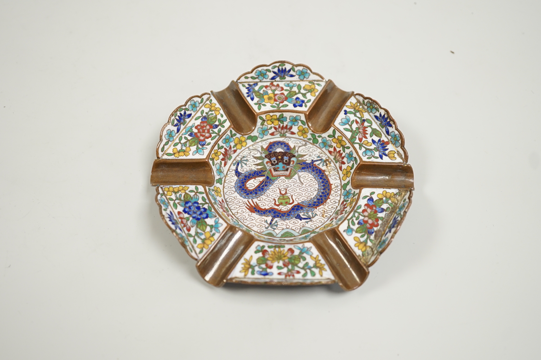 A Chinese cloisonné enamel 'dragon' ashtray, 12cm diameter